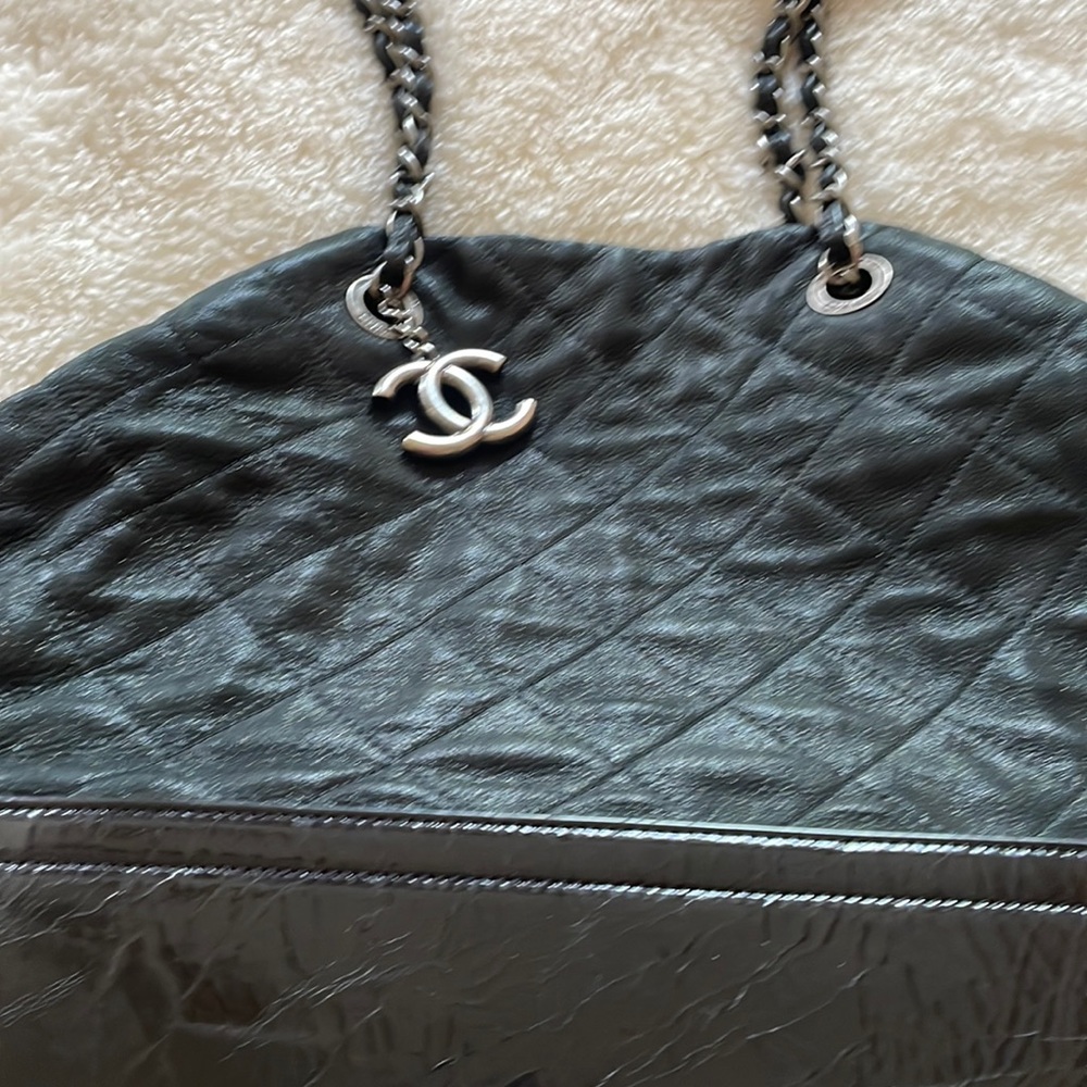 Authentic Chanel tote, looking for a new home. Pre loved and excellent shape.